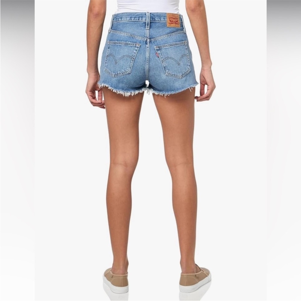 Levi’s | Women's Classic Medium Blue Denim 501 Buttonfly Raw Hem Shorts Size 28